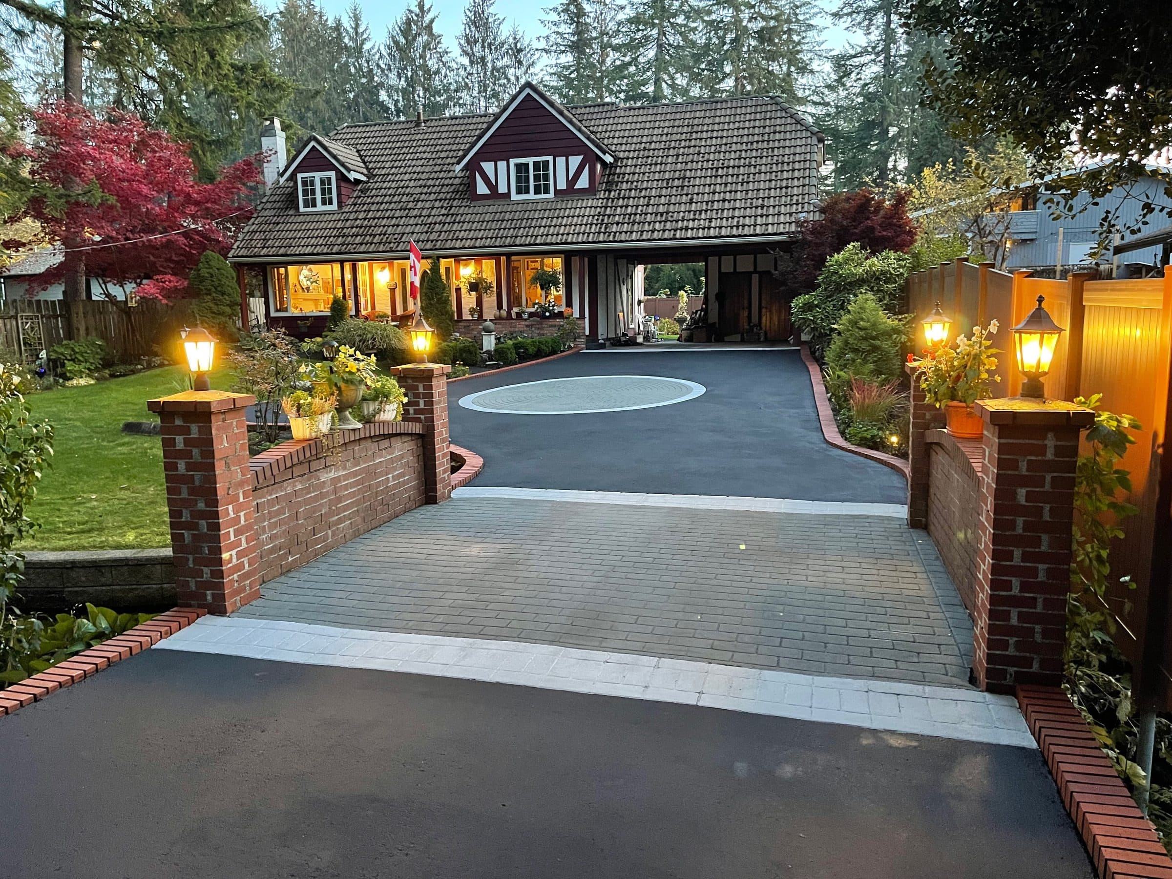 A StreetBond driveway recoat in Maple Ridge photographed at dusk, installed by Square One Paving