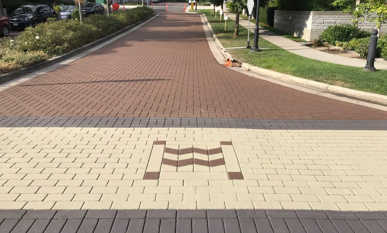 Windsor Gate Coquitlam: Stamped Asphalt Driveways for Polygon Realty